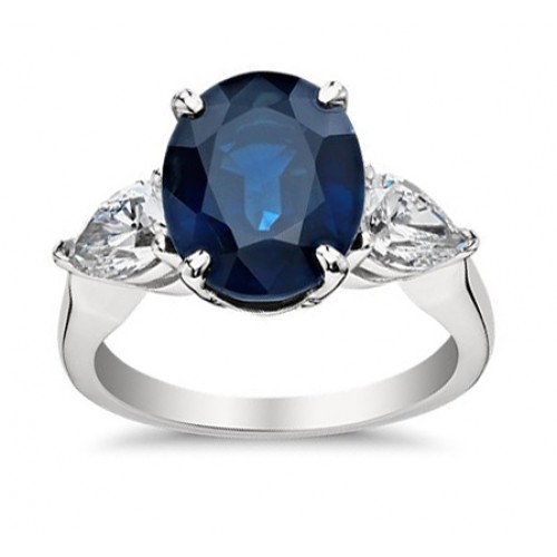 9.33 ct Oval Shape Sapphire With Pear Shape Diamond Anniversary Ring